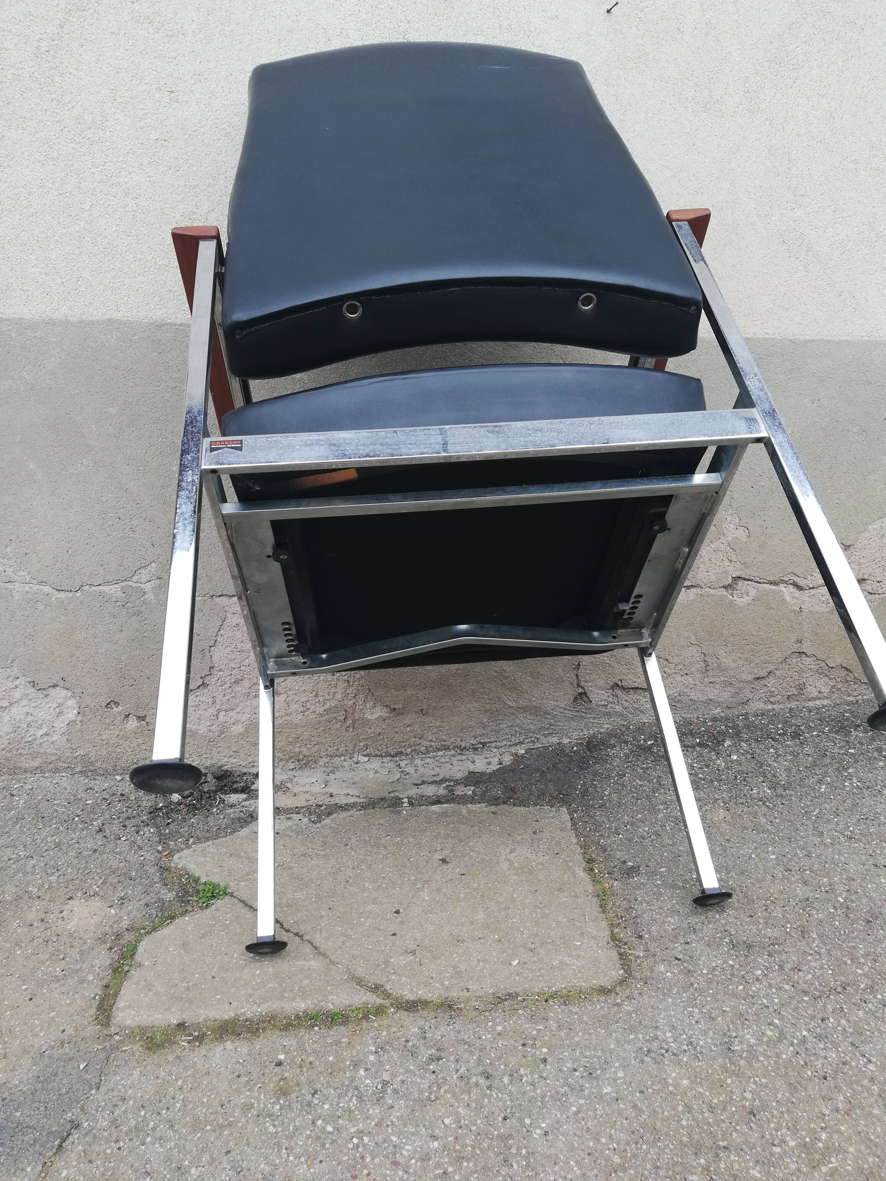 Vintage leather and teak armchair
