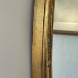 Oval mirror in carved wood