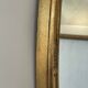 Oval mirror in carved wood
