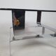 Table basse métal chromé et verre fumé 70