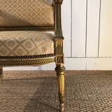 Louis XVI armchair in gilded wood carved and molded