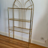 Gilded metal grid shelf in the shape of a vaulted arch
