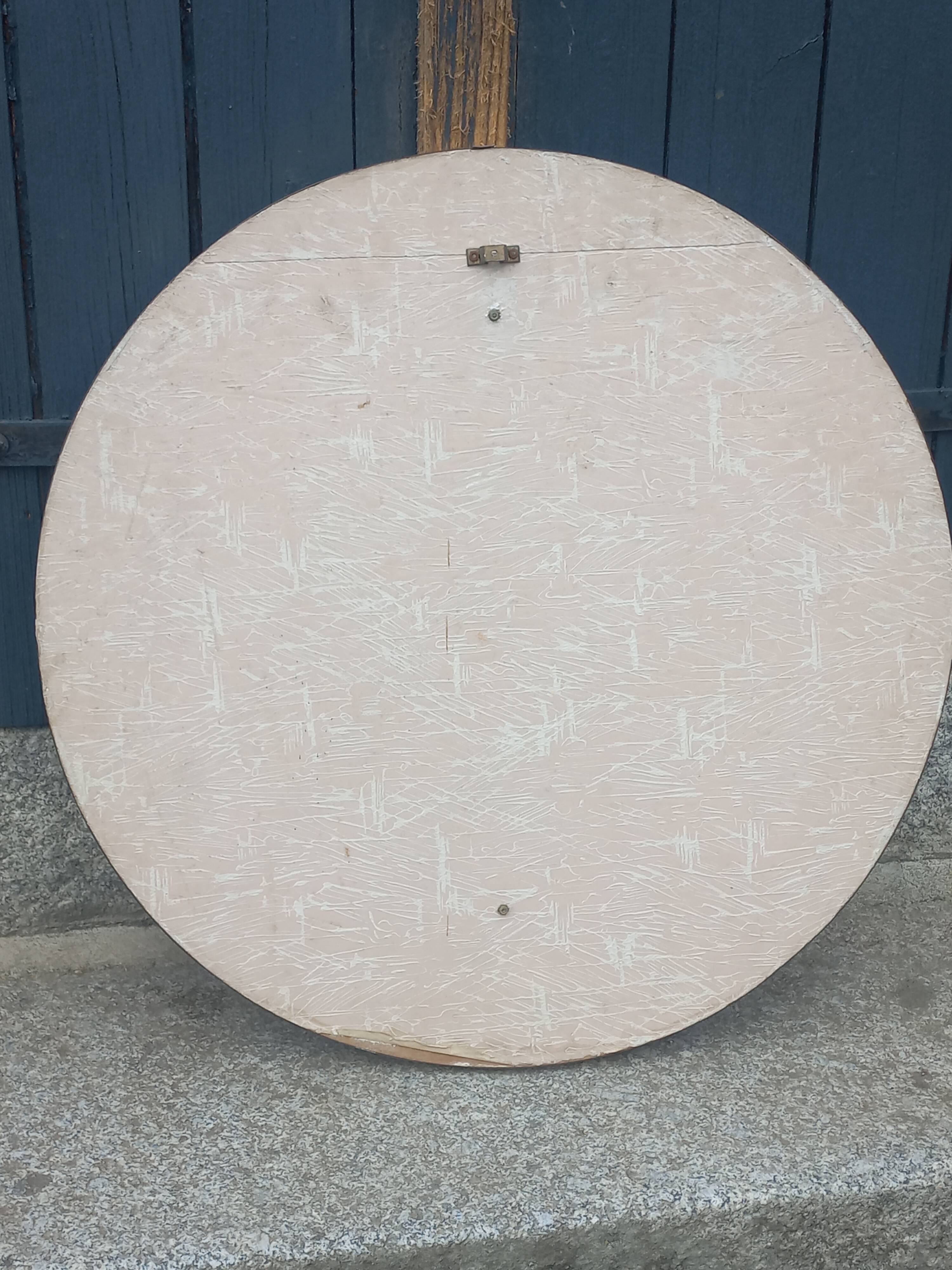 Vintage ceramic mirror from the 1960s.