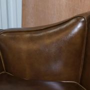Restored Regency canapé in leather with sculpted Hermès frame.