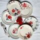 Old flat plates mismatched in earthenware