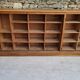 Oak workshop furniture with sliding doors.