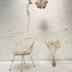 Basket armchair in metal and wood.