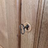 Buffet made of natural wood and bronze green.