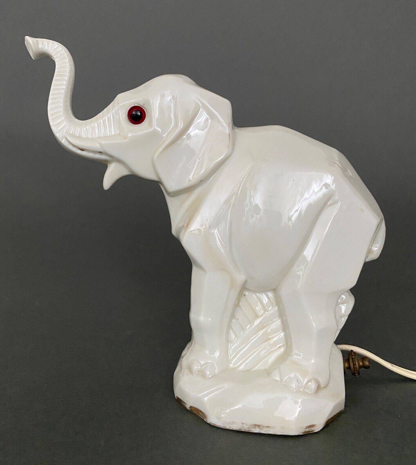 Art Deco 1930 elephant night light in white porcelain