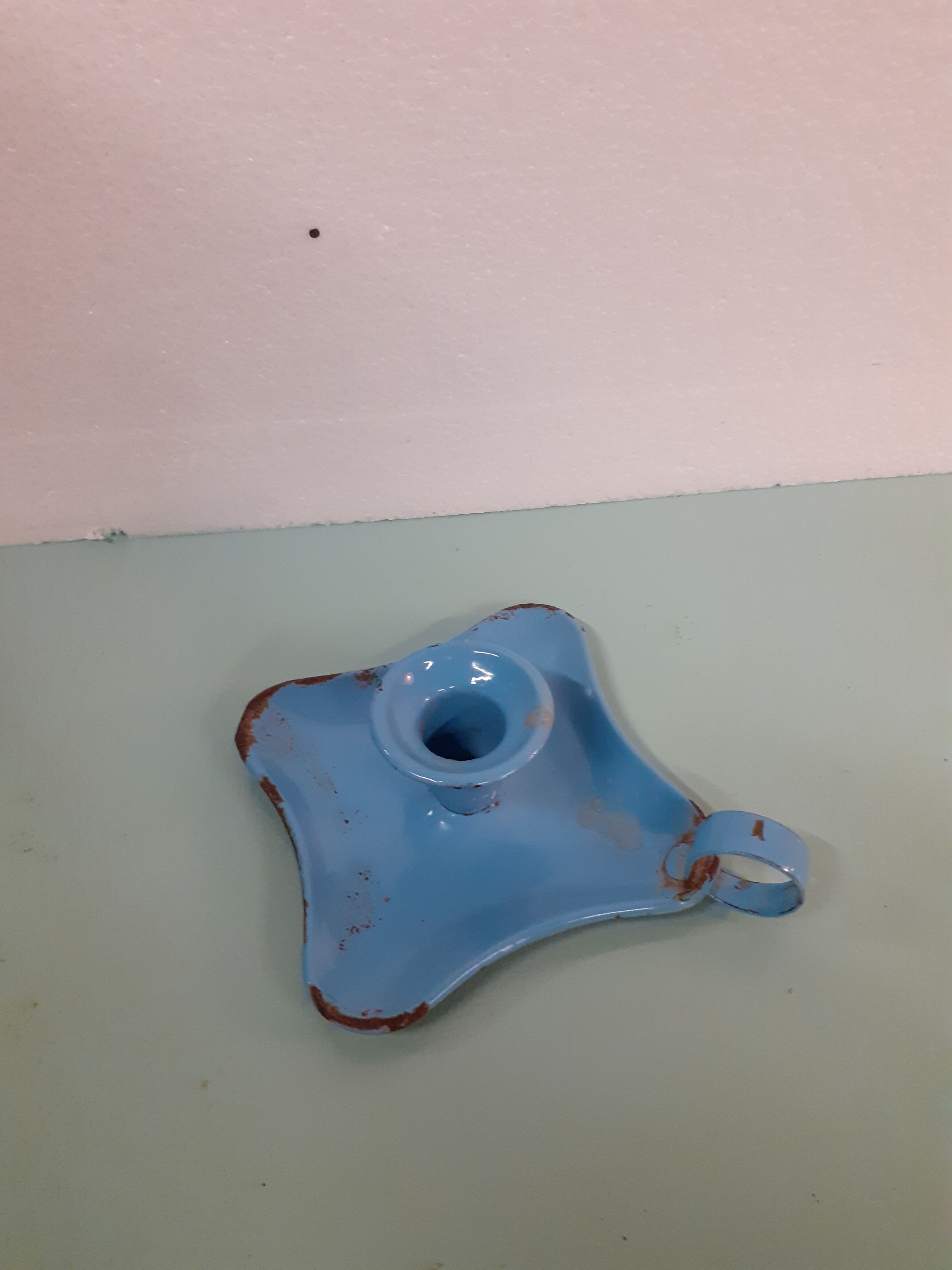Enamelled sheet metal candlestick