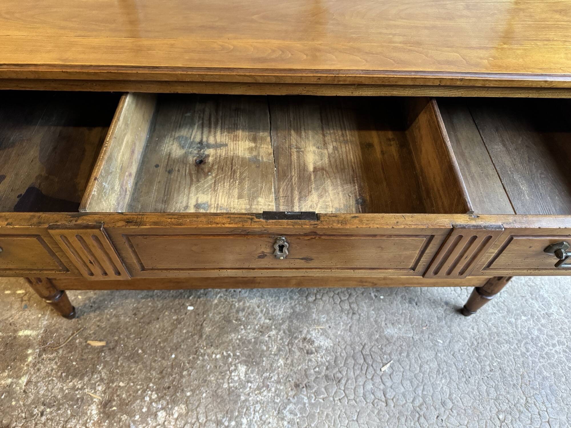 18th-century antique chest of drawers from the Louis XVI period in blonde walnut.