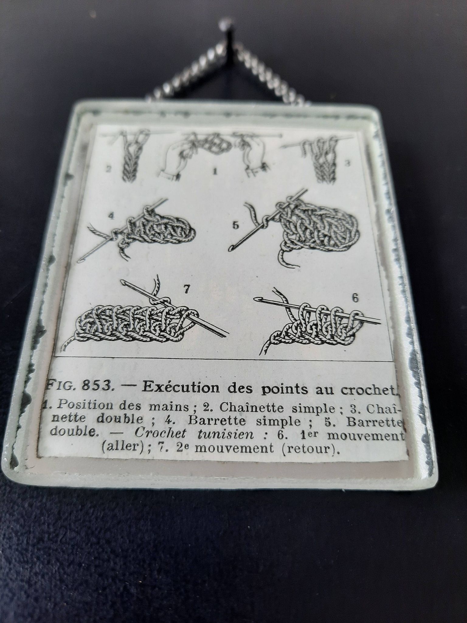 Antique illustration "Hook" inserted under a mirror. Cabinet of Curiosities.