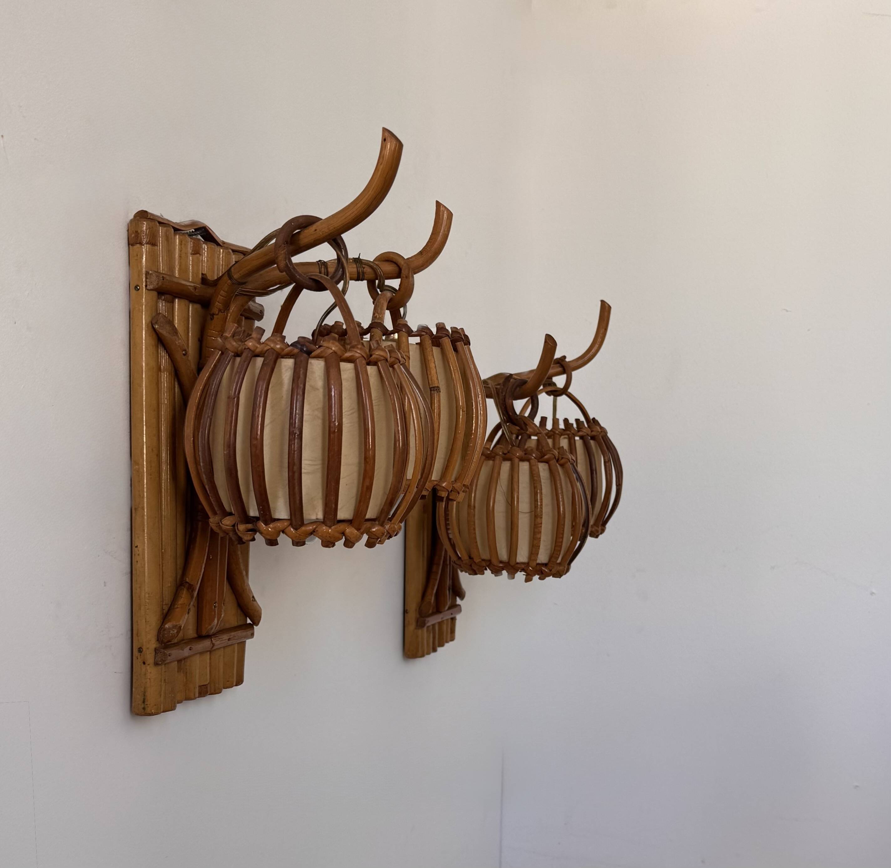 Vintage pair of rattan wall lights, France, 1950.