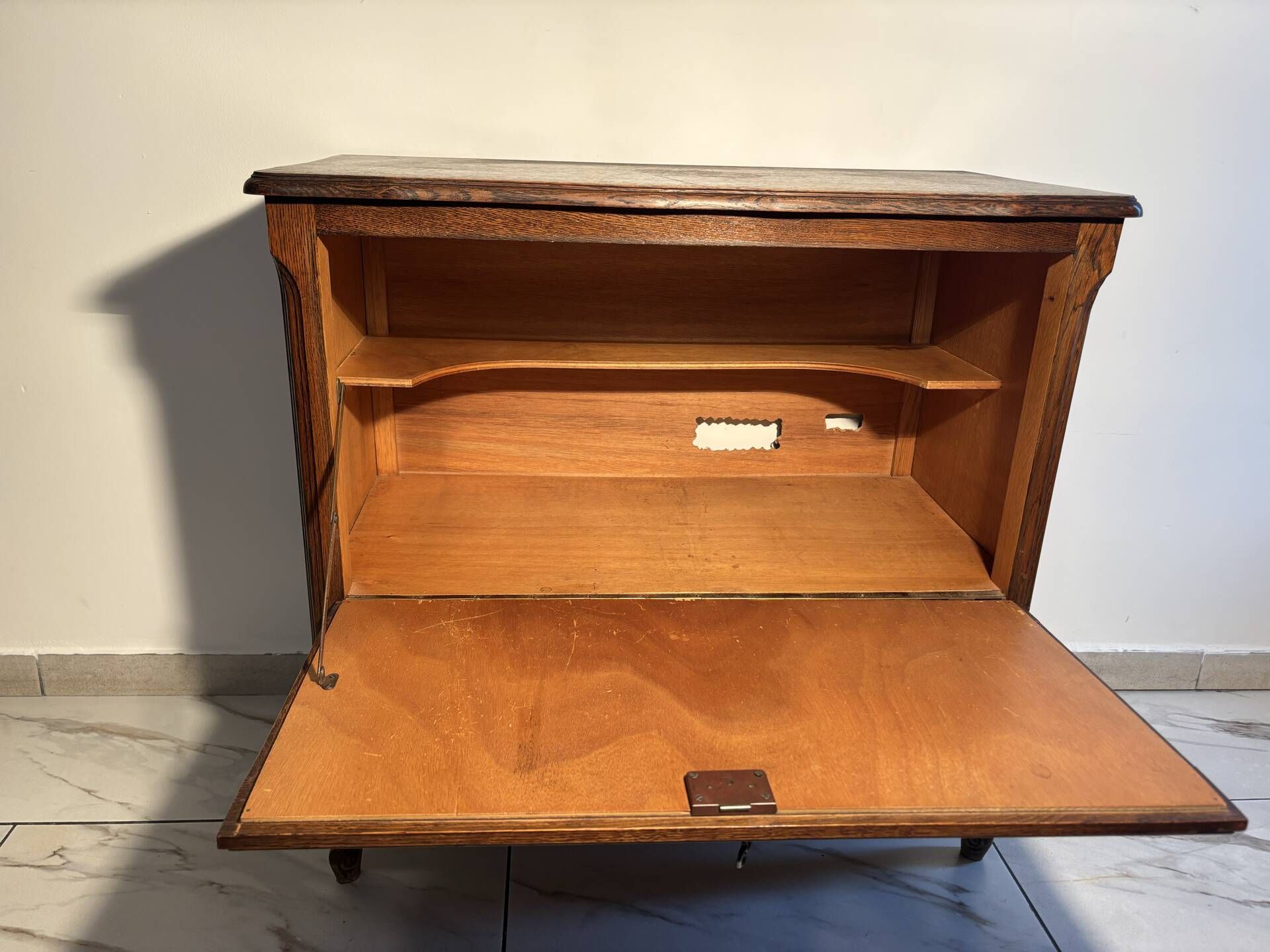 Louis XV style oak TV cabinet with drop-down flap.