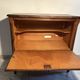 Louis XV style oak TV cabinet with drop-down flap.