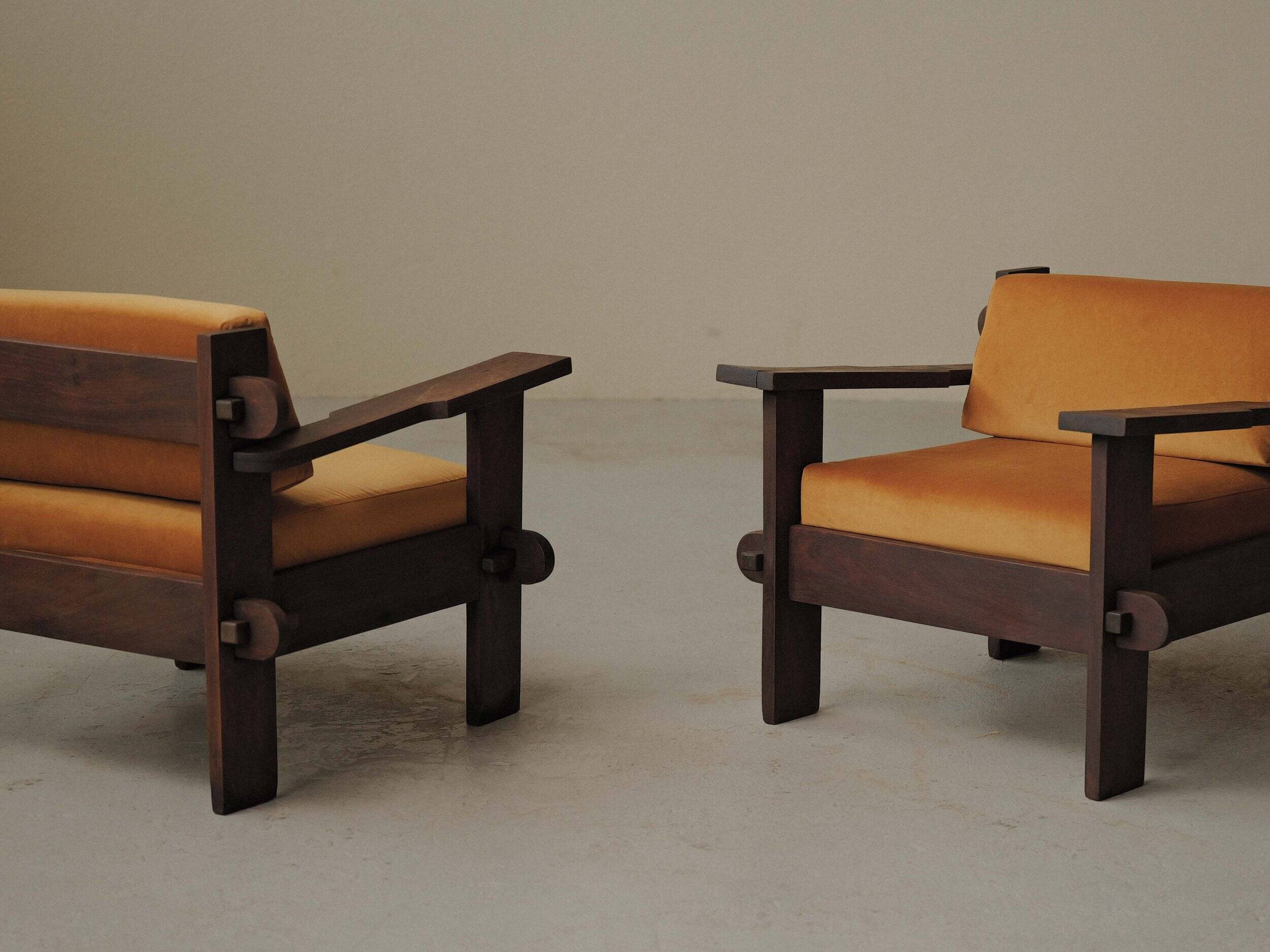 Pair of architect's armchairs in solid wood, France, circa 1970.
