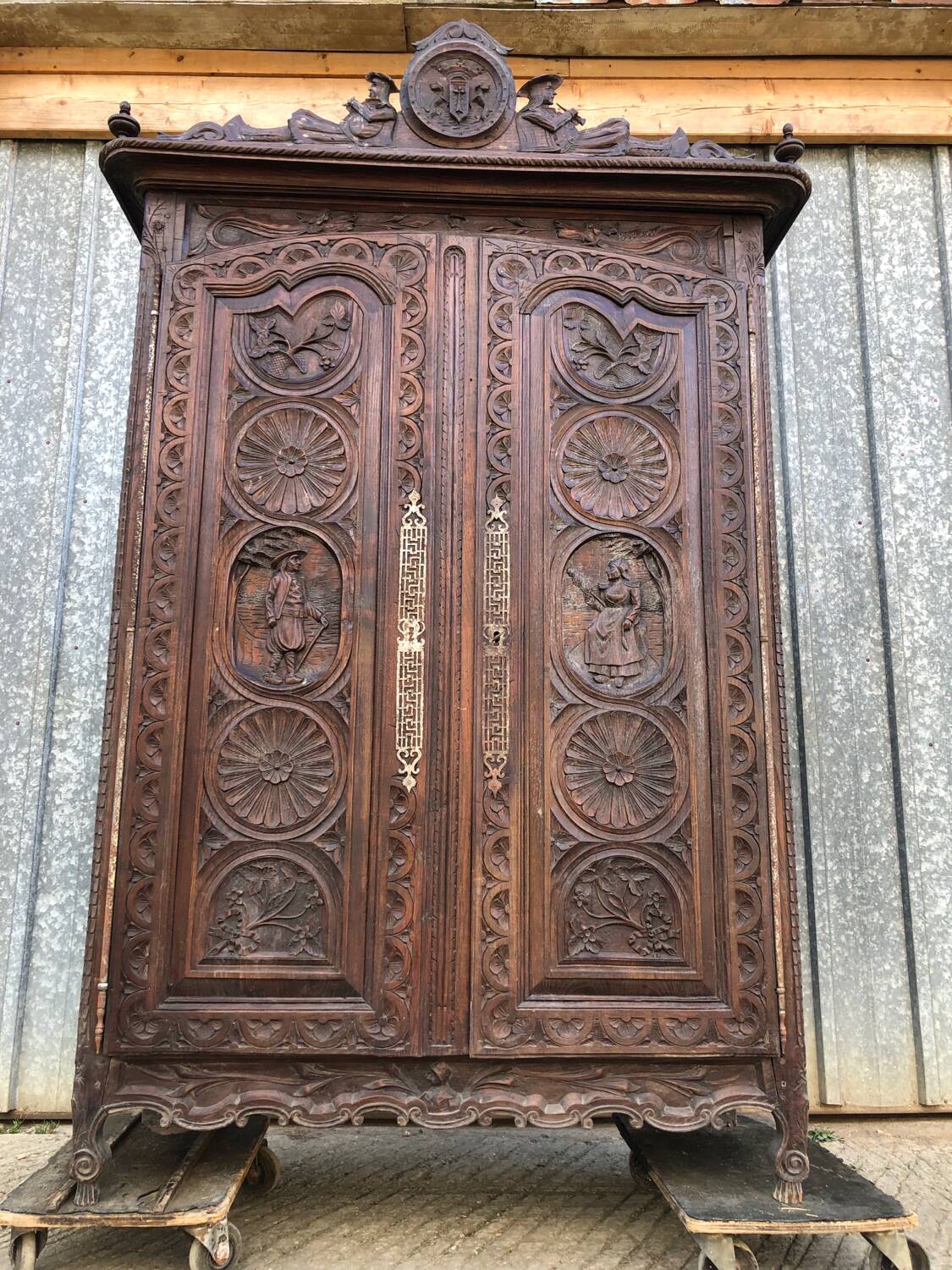 Antique Breton oak cabinet, richly carved