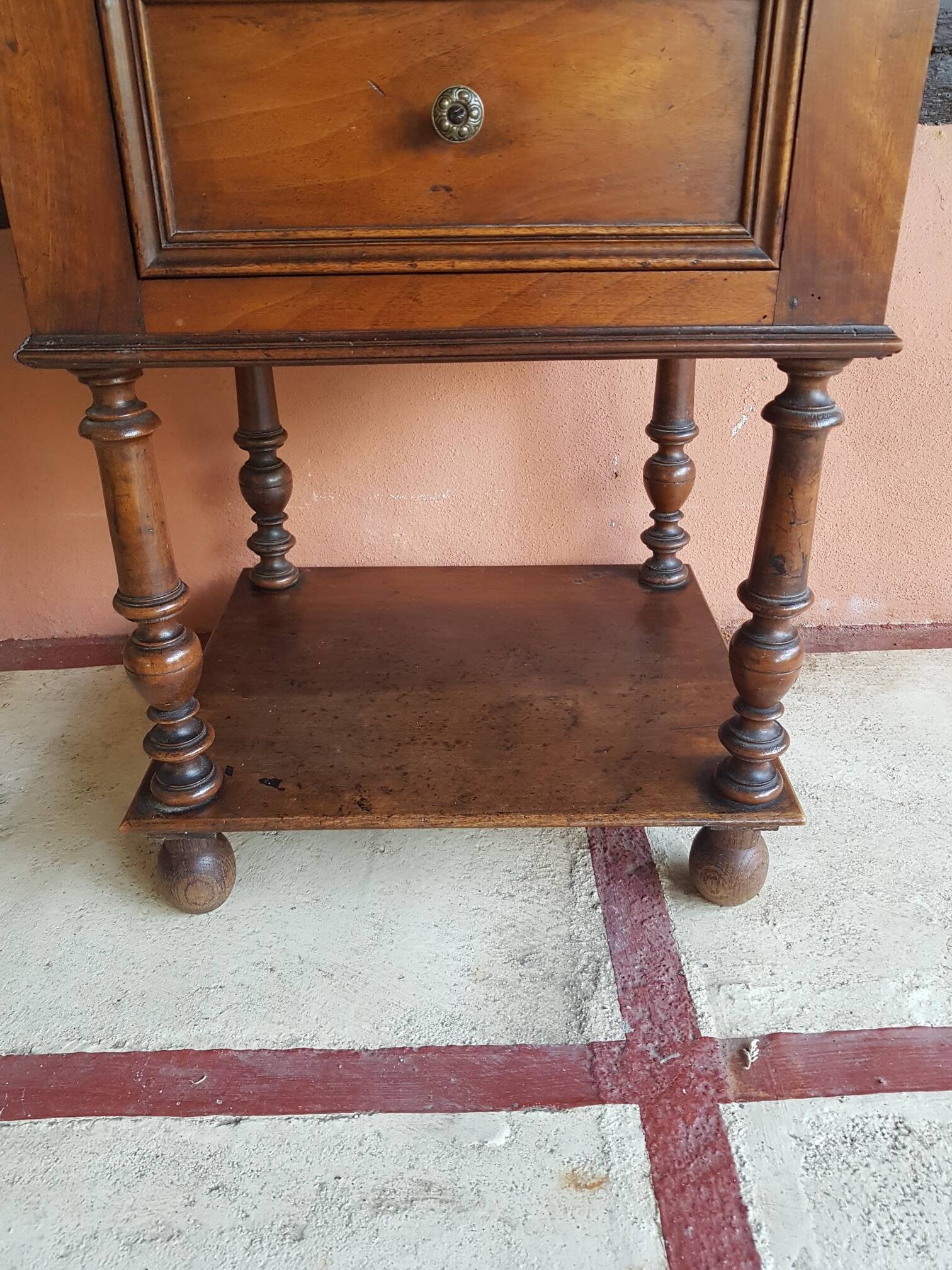 Old wooden marble bedside table