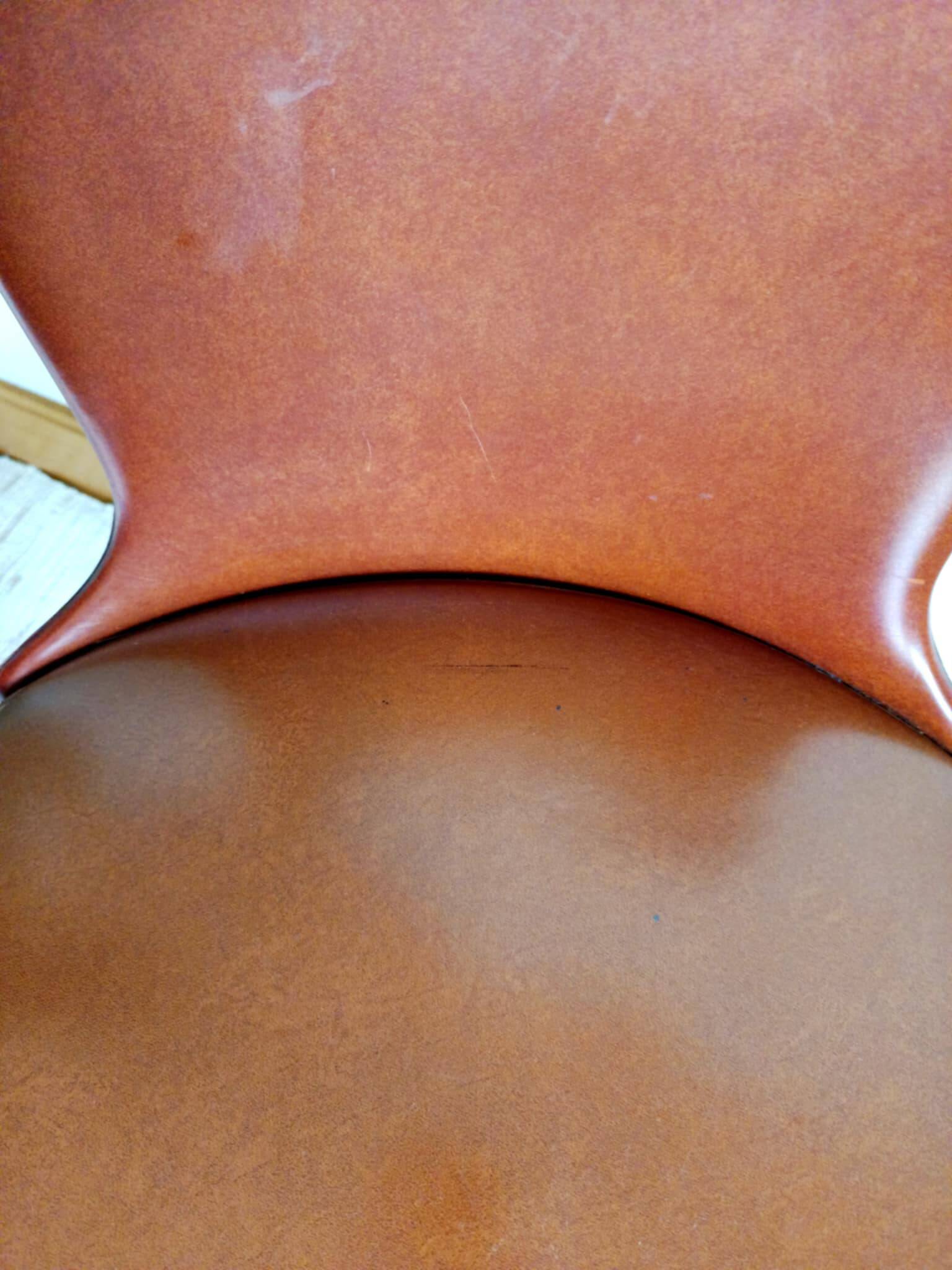 Pair of vintage vinyl chairs with splayed legs