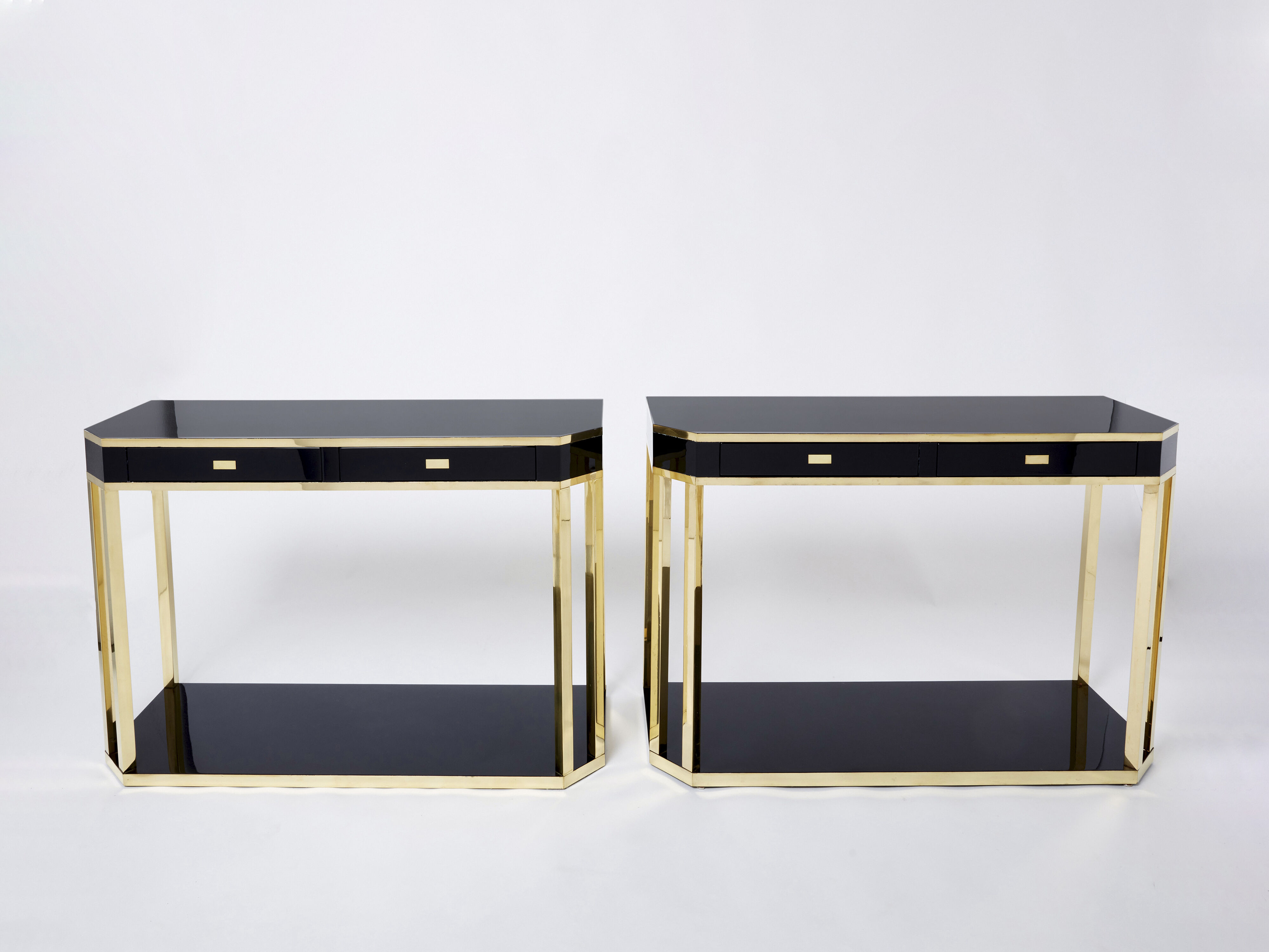 Pair of black lacquered consoles and brass 1970