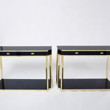 Pair of black lacquered consoles and brass 1970