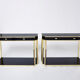 Pair of black lacquered consoles and brass 1970