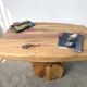 Organic brutalist coffee table in solid cedar, trunk pedestal, 1970s.