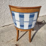 Armchair backrest rounded fish head