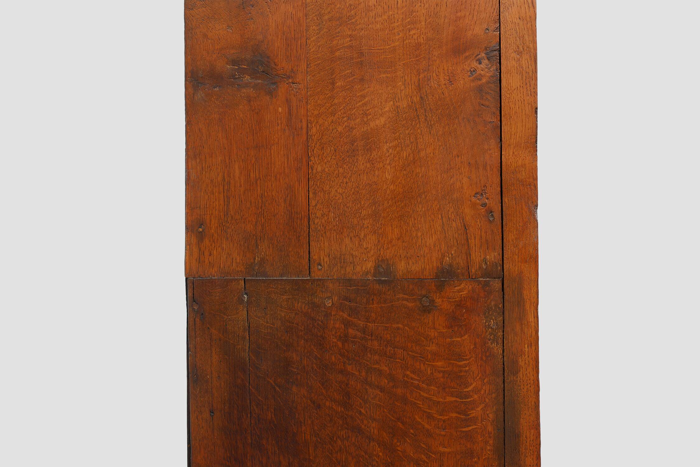 Tall rustic French monastery wardrobe in oak from the late 19th century
