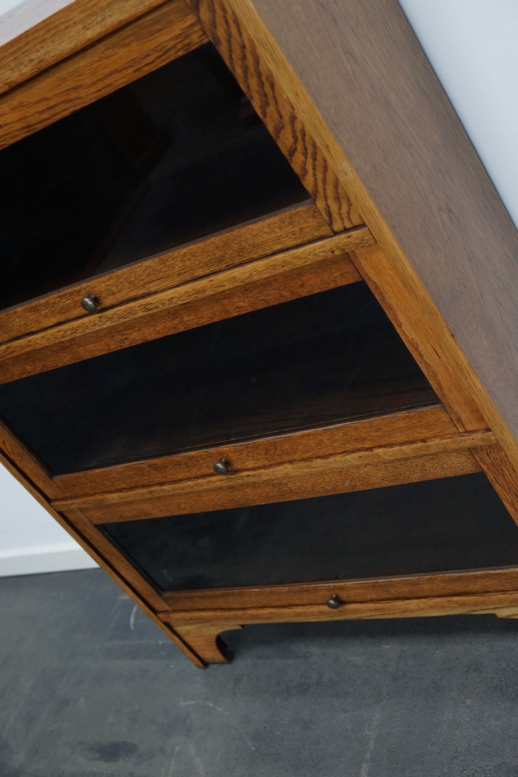 German Oak Bookcase with Folding Doors In Style of Globe Wernicke, ca 1930s