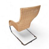 2 x Weighty rattan lounge chair / brown leather 1990s  Very good condition