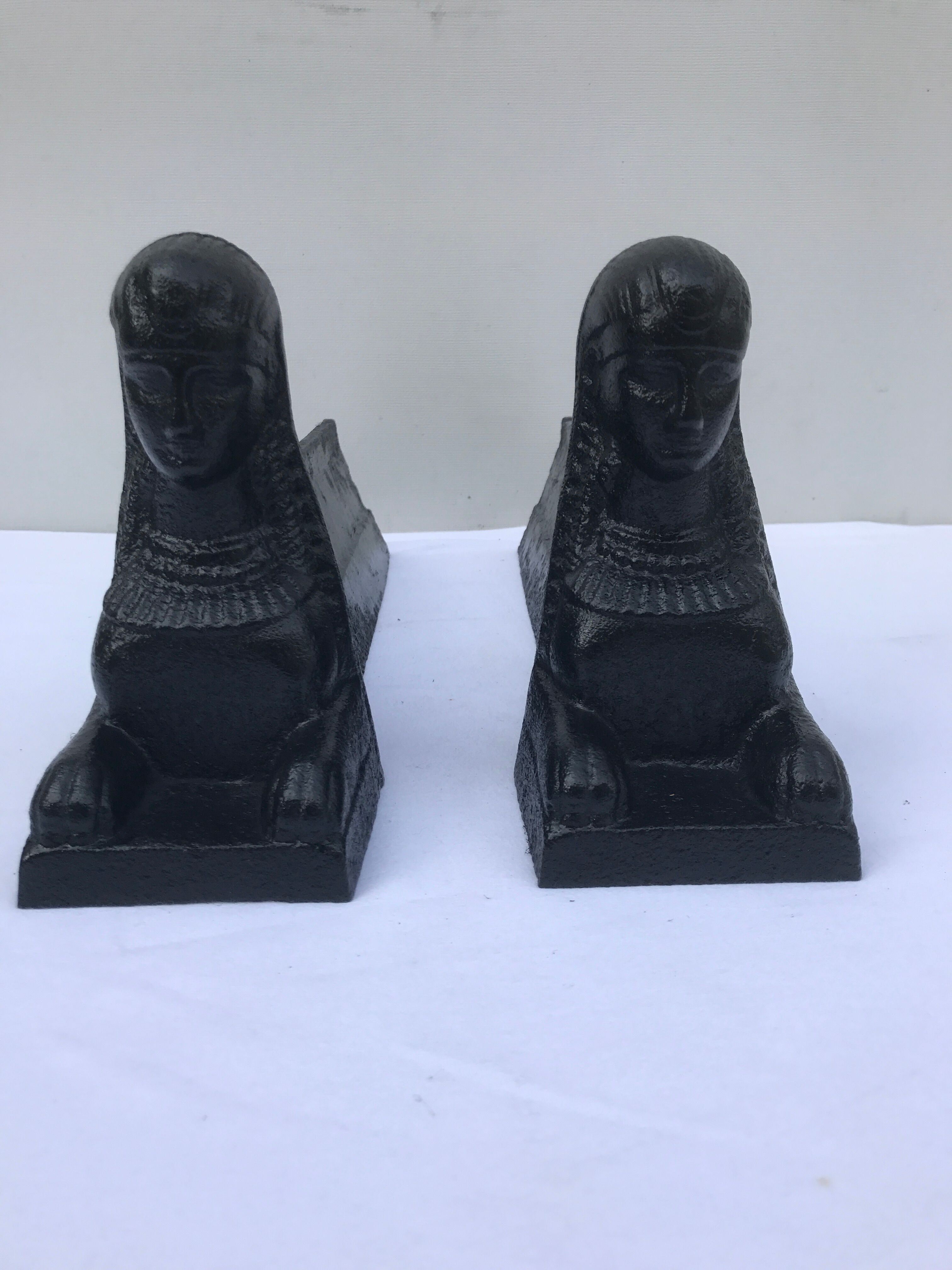 Former Egyptian cast-iron chenet in vintage black metal