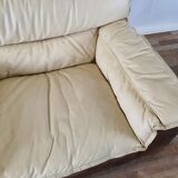 Fauteuil avec pouf en cuir et daim