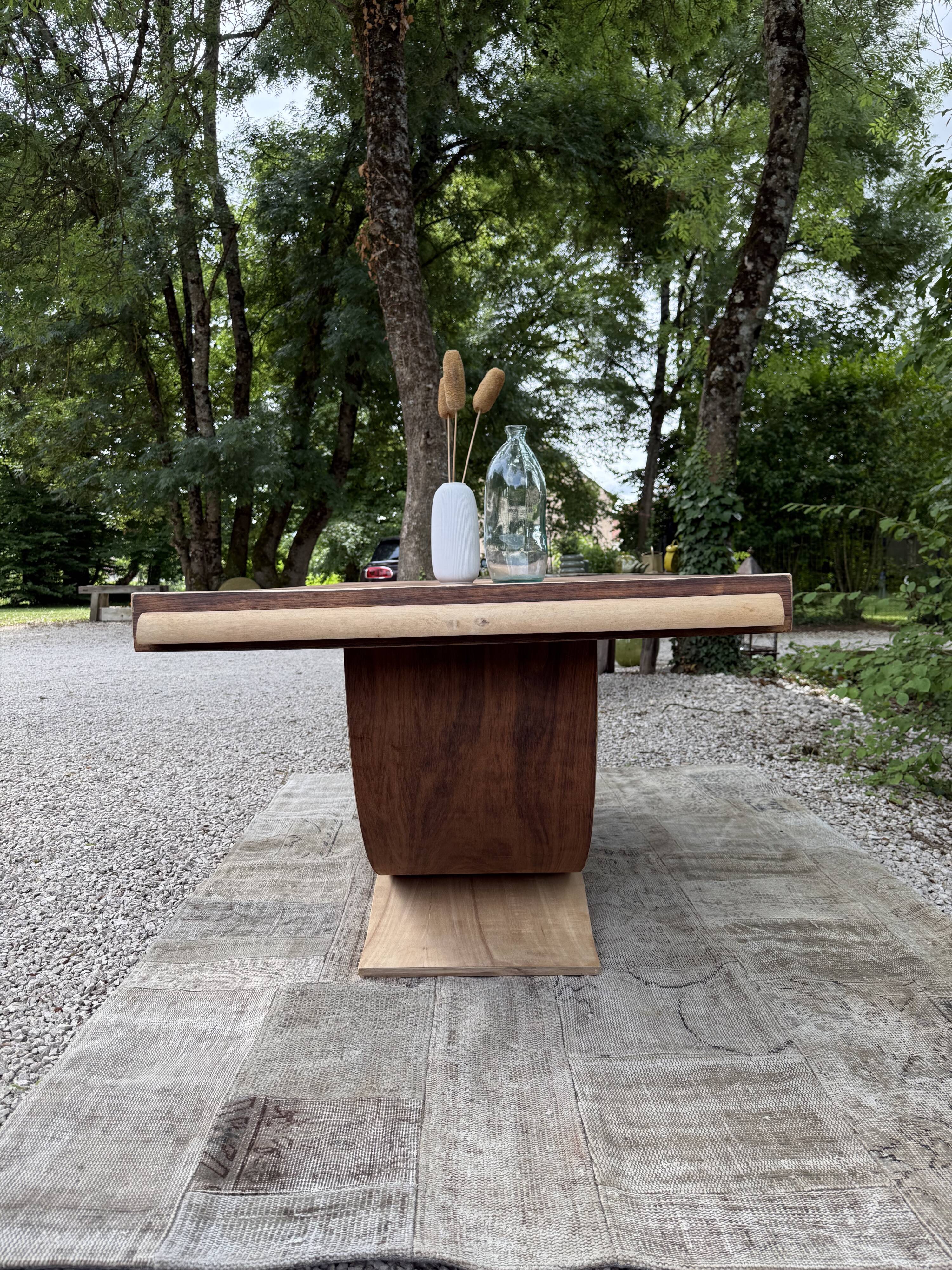 Renovated wooden table with extensions.