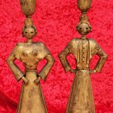 Pair of gilded beaten iron sculpture lamps attributed to Gilbert Poillerat