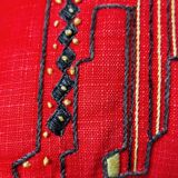 Vintage hand embroidered canvas cushion