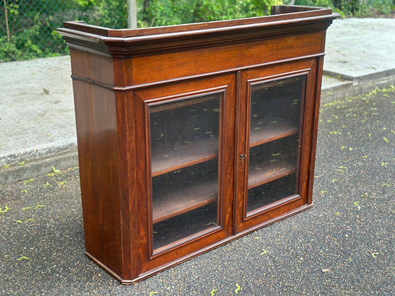 Glass library in Louis Philippe style from the 19th century made of solid wood.