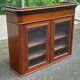 Glass library in Louis Philippe style from the 19th century made of solid wood.