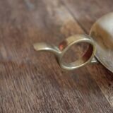 Brass cellar rat candlestick