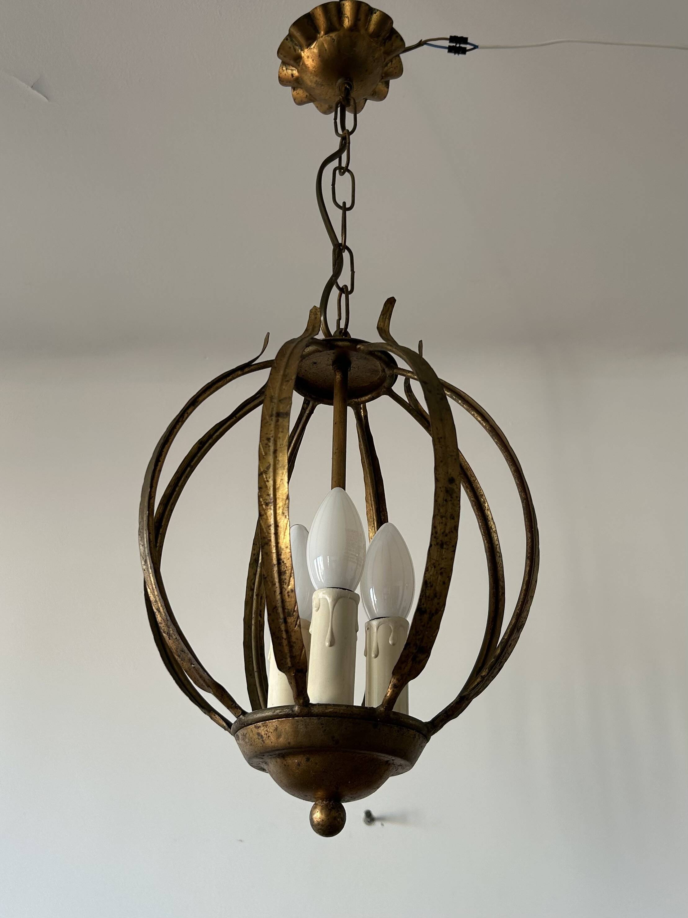 Chandelier, antique gold metal suspension.