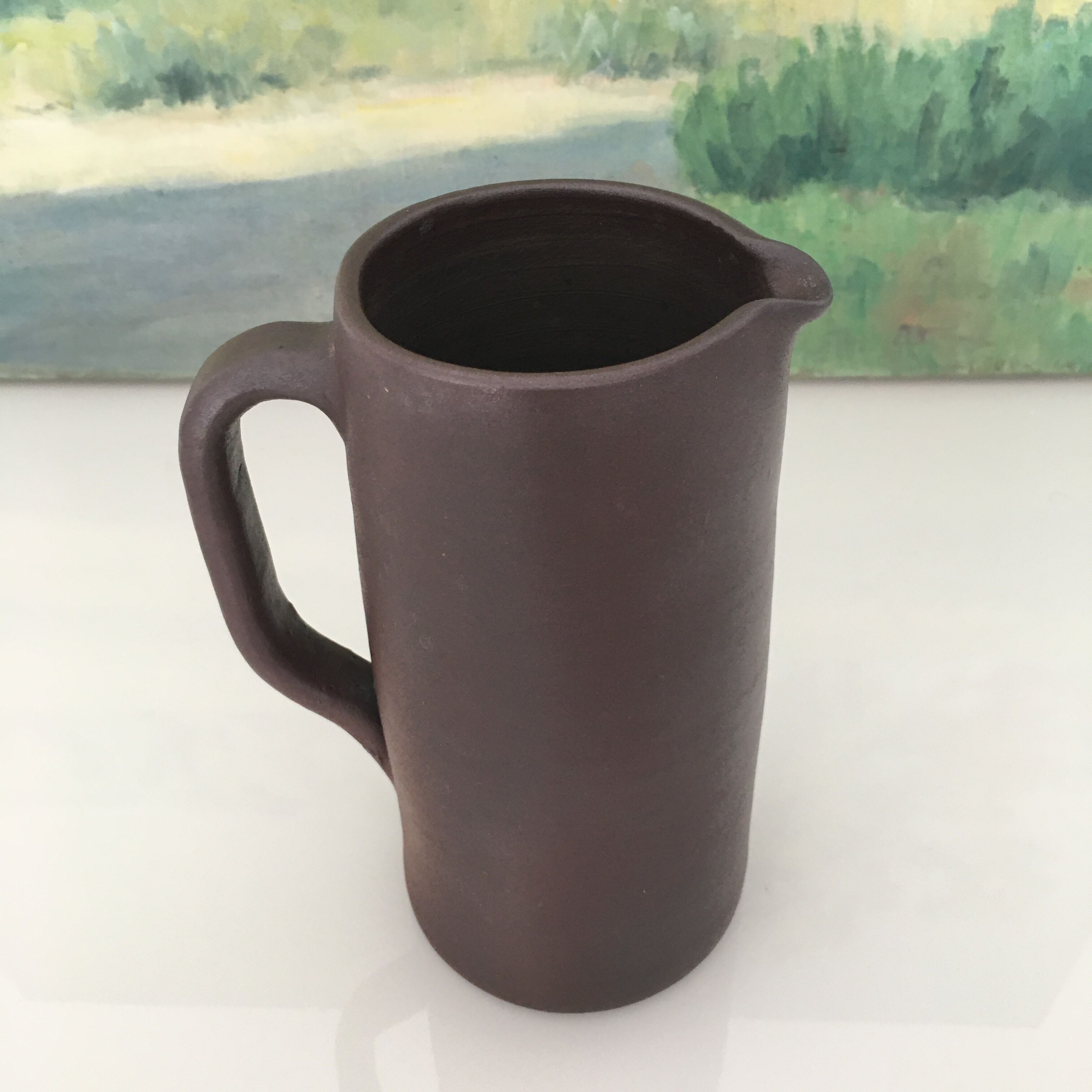 Dark brown sandstone pitcher