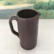 Dark brown stoneware jug