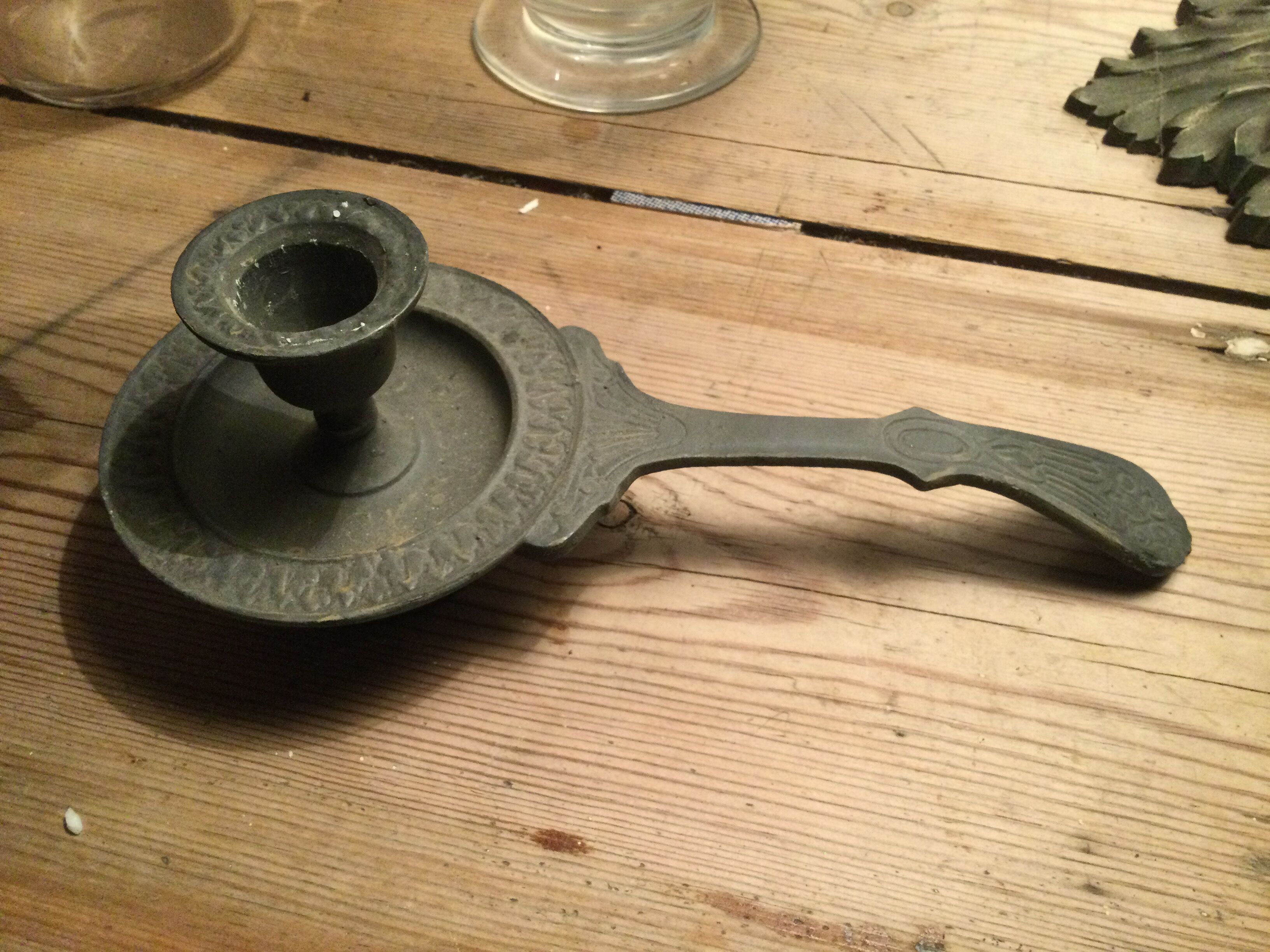 Pair of cast iron candle holders