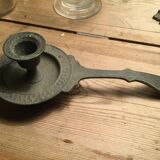 Pair of cast iron candle holders