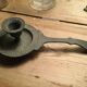 Pair of cast iron candle holders