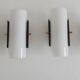 Set of four wall lights in white plexiglass and perforated black metal.