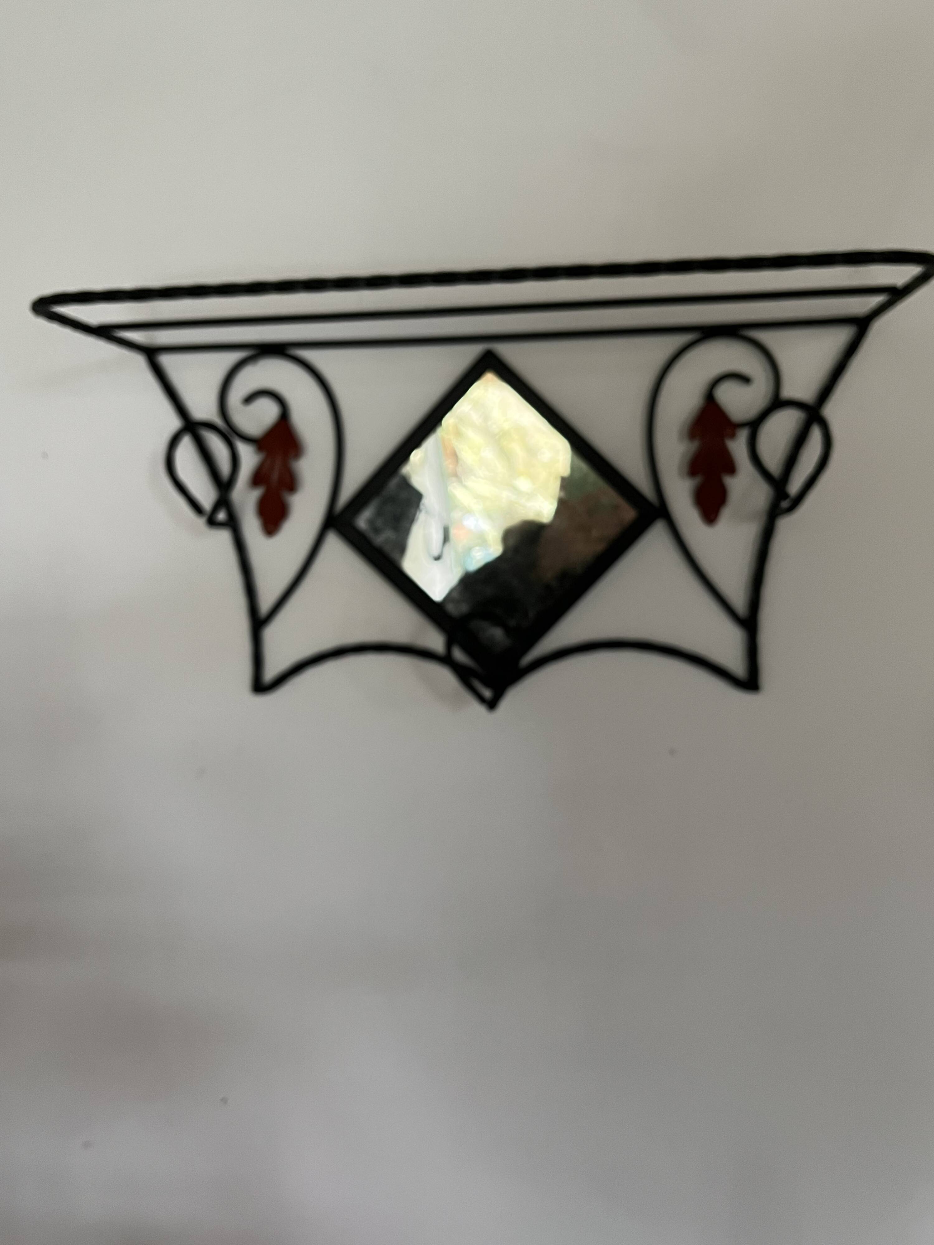 Wrought iron coat rack