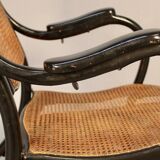 Bentwood cane armchair with mechanism and footrest