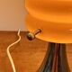 Vintage orange lamp with chrome tulip base and glass shade
