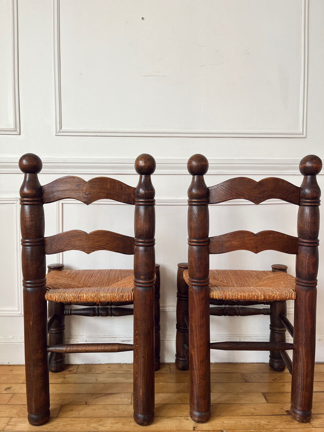 Pair of rustic chairs in the style of Charles Dudouyt.